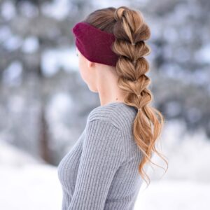 Side view of girl with long hair wearing a red headband modeling "Pull Thru Ponytail" hairstyle