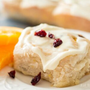 cran-orange-cinnamon-rolls-perfect-for-fall-and-winter-topped-with-orange-cream-cheese-frosting