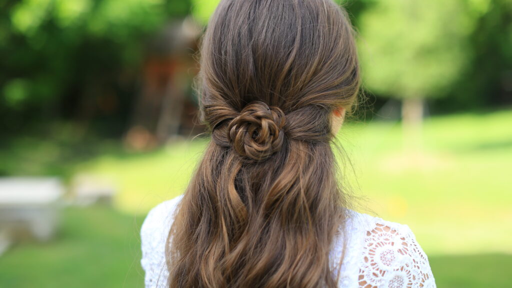 Close up of "Rosette Tieback" hairstyle