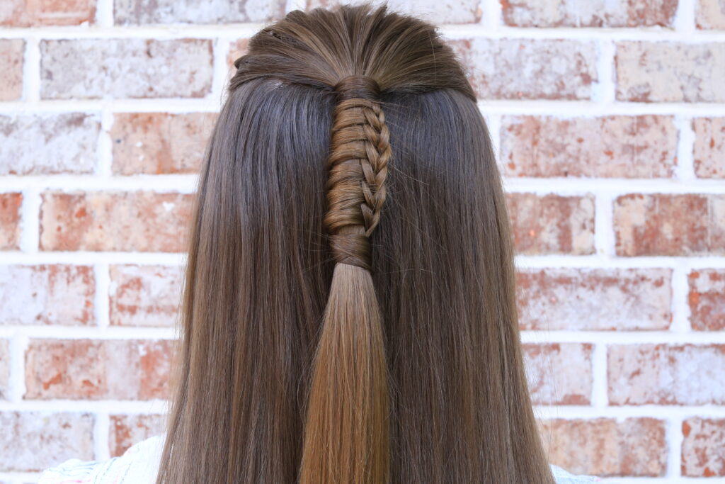 Back view of girl with long hair modeling "Reverse Chinese Ladder" hairstyle