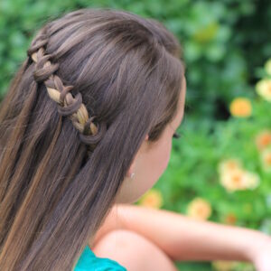 Young girl modeling Knotted Waterfall Braid