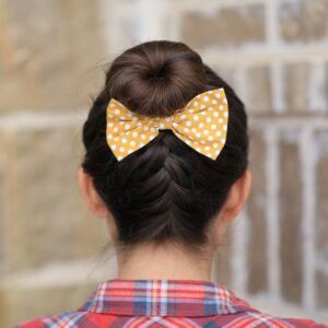 (Back) Young girl outside modeling French-Up High Bun | Updo Hairstyle Ideas