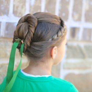 Young girl outside modeling Disney Frozen inspired Anna's Coronation Hairstyle