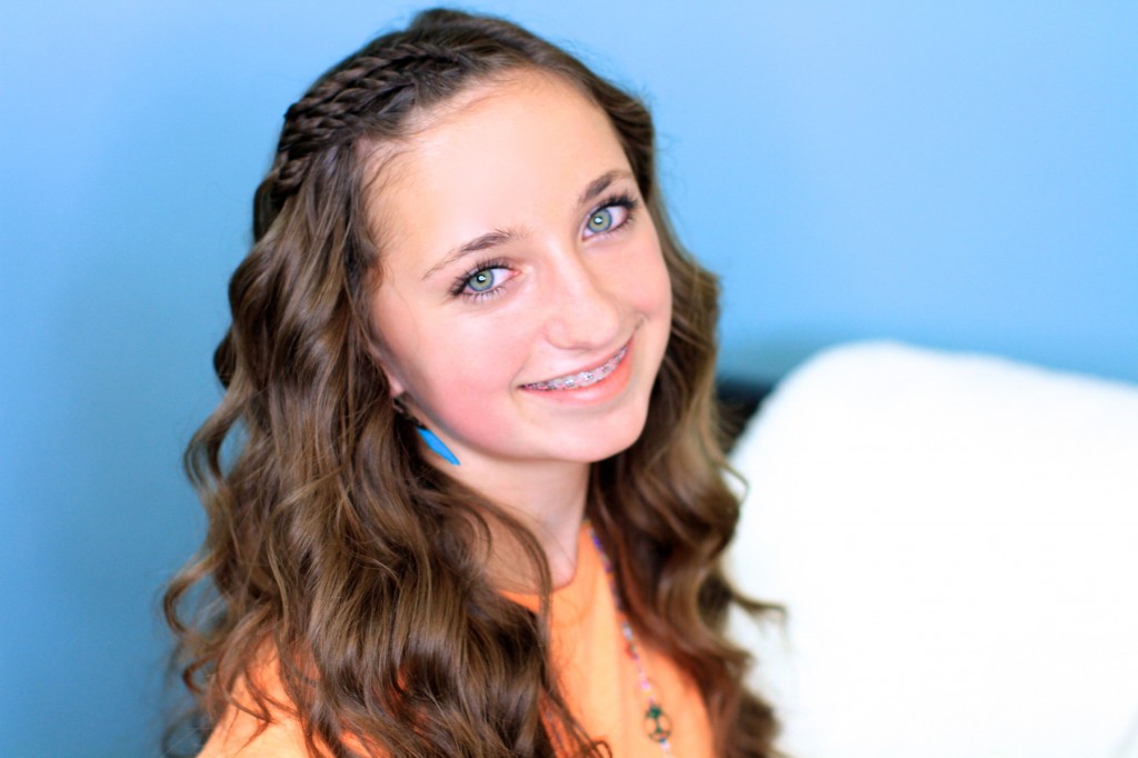 Portrait of a young girl indoors modeling Triple Lace Twists | Cute Hairstyles