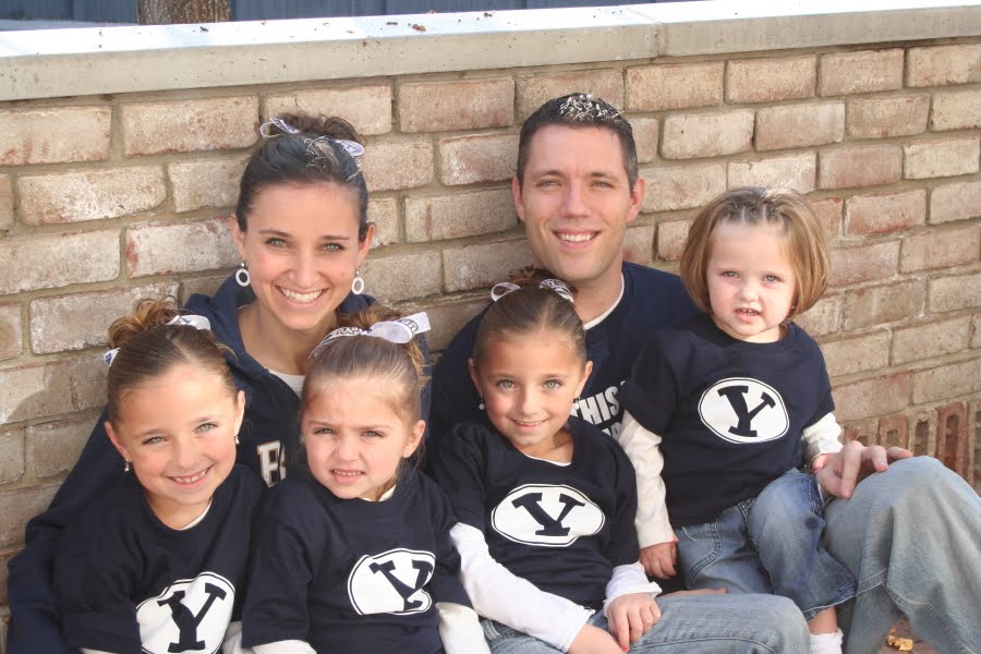McKnight family before adoption, in BYU clothing