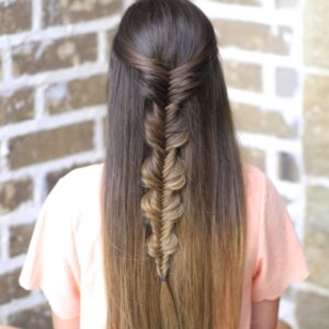 Young girl with long hair modeling Bubble Fishtail Braid