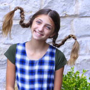young girl modeling Pippi Longstocking Braids