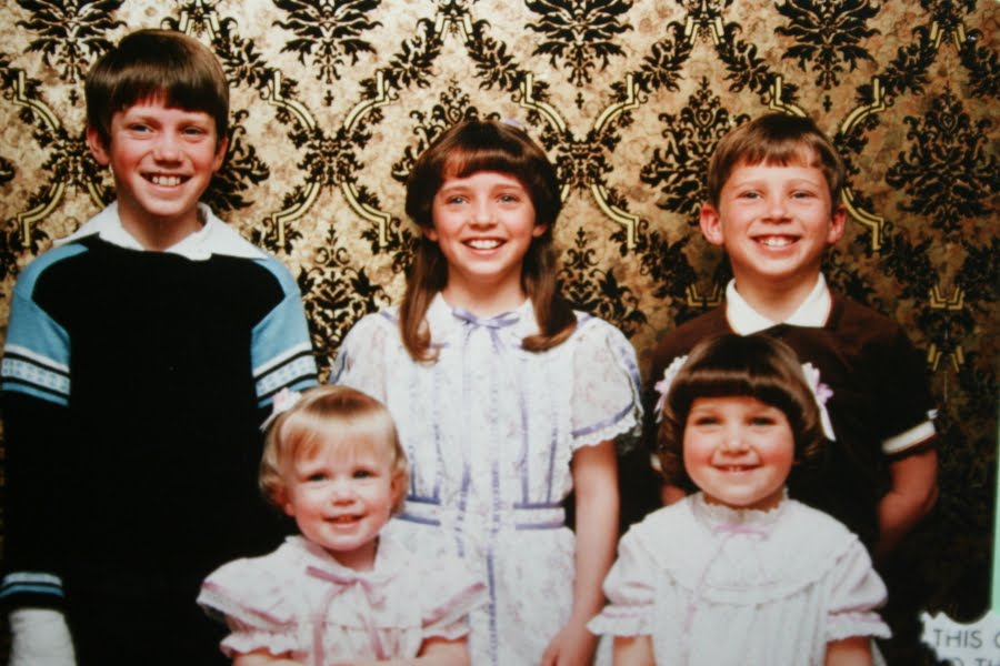 Mindy McKnight, age 5, with her two sisters and two brothers