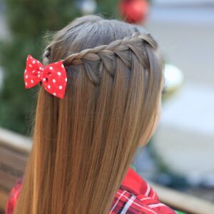 Young girl outside modeling Upward Lace Braid