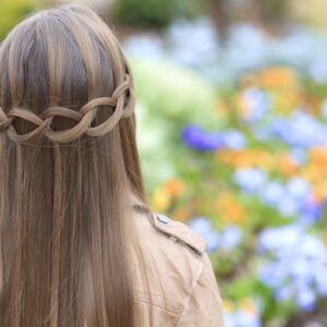 Young girl outside modeling Loop Waterfall Braid